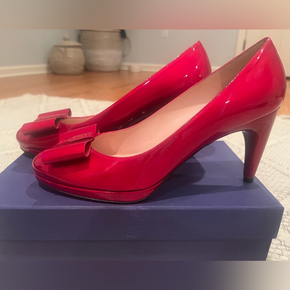 Stuart Weitzman red patent leather heels with bow.
